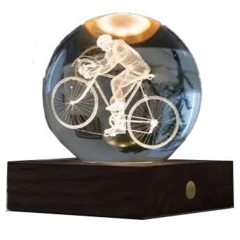 Ginkgo Amber Crystal Paperweight With Cyclist Sculpture 1