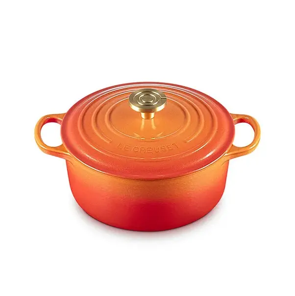 Le Creuset Flame Doree 4.5-Quart Round Dutch Oven – Crucible Knob Design 1